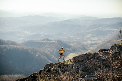 Man hiking up the path on a mountain